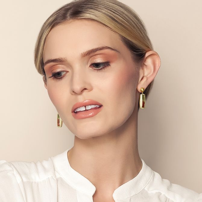 Tourmaline earrings on female model