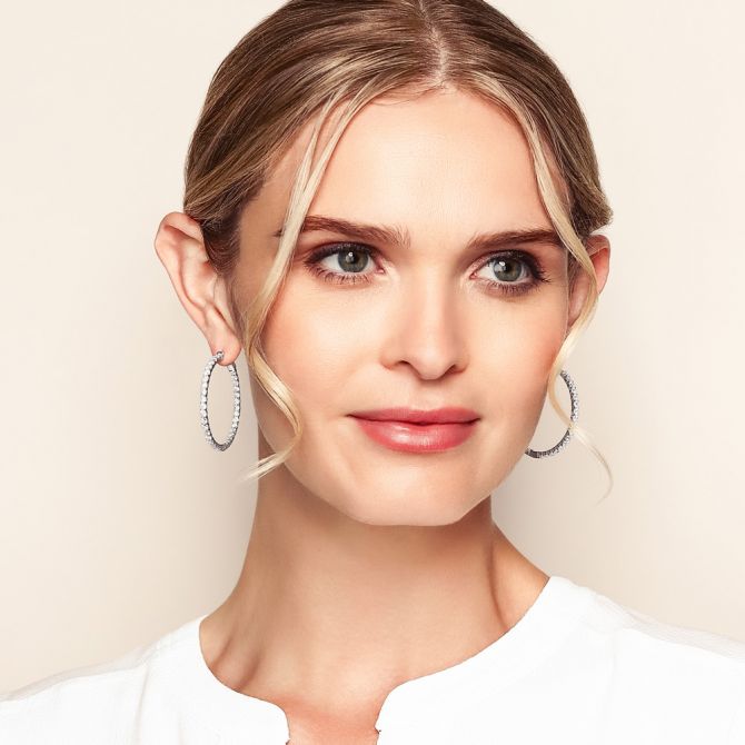 Inside out hoop earrings on a model