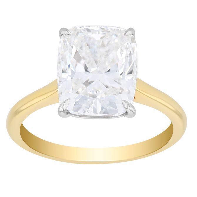 Cushion cut solitaire preset engagement ring in yellow gold