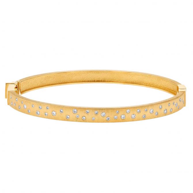 Marika Scattered Diamond Flush Set Hinged Bangle Bracelet in Yellow Gold