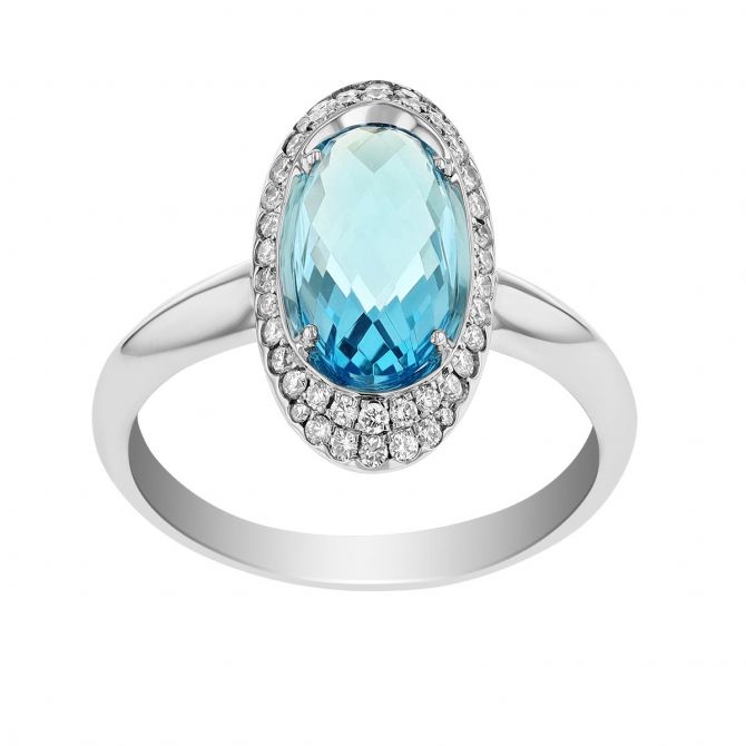 Oval Topaz & Diamond Halo Ring in White Gold