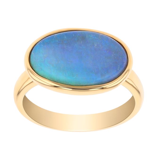 Oval Cabochon Black Opal Bezel Set Ring in Yellow Gold