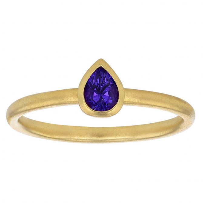 Pear Shaped Purple Sapphire Bezel Set Solitaire Ring in Yellow Gold