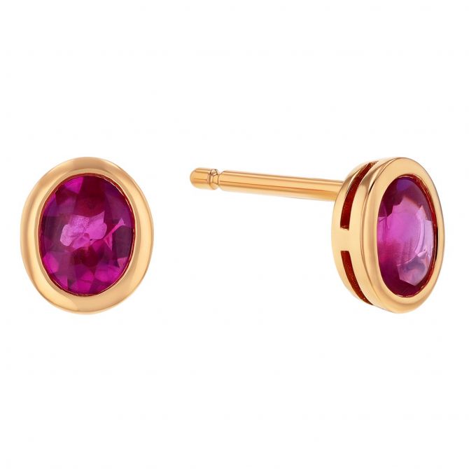 Oval Pink Sapphire Bezel Set Stud Earrings in Yellow Gold