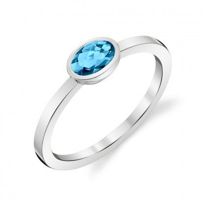 Oval Blue Topaz Bezel Set Ring in White Gold | Borsheims