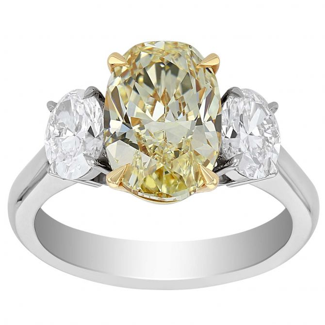 Fancy Light Yellow Oval Diamond 3 Stone Ring in Platinum